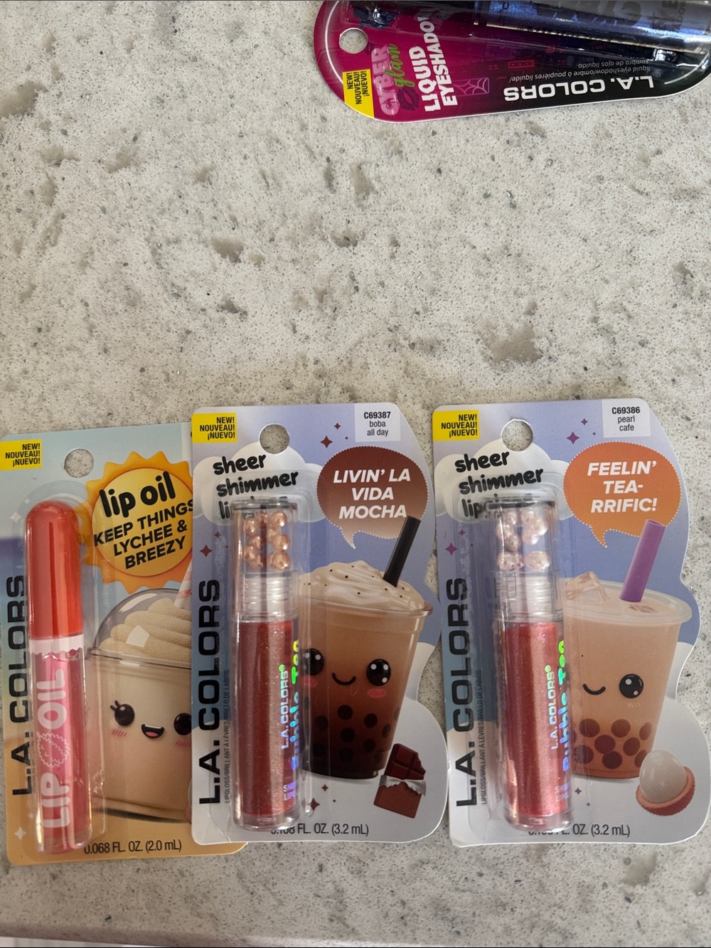 L. A. Color trio of lip gloss and lip oil